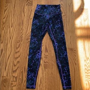 Lululemon long pants with purple / black print.